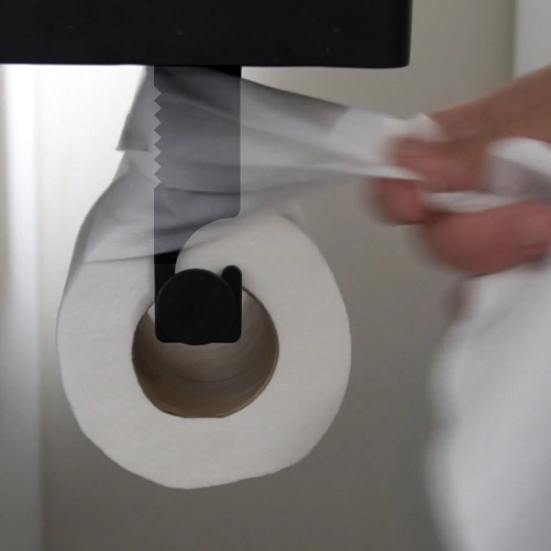 Woman tearing toilet paper with one hand with TidyTear
